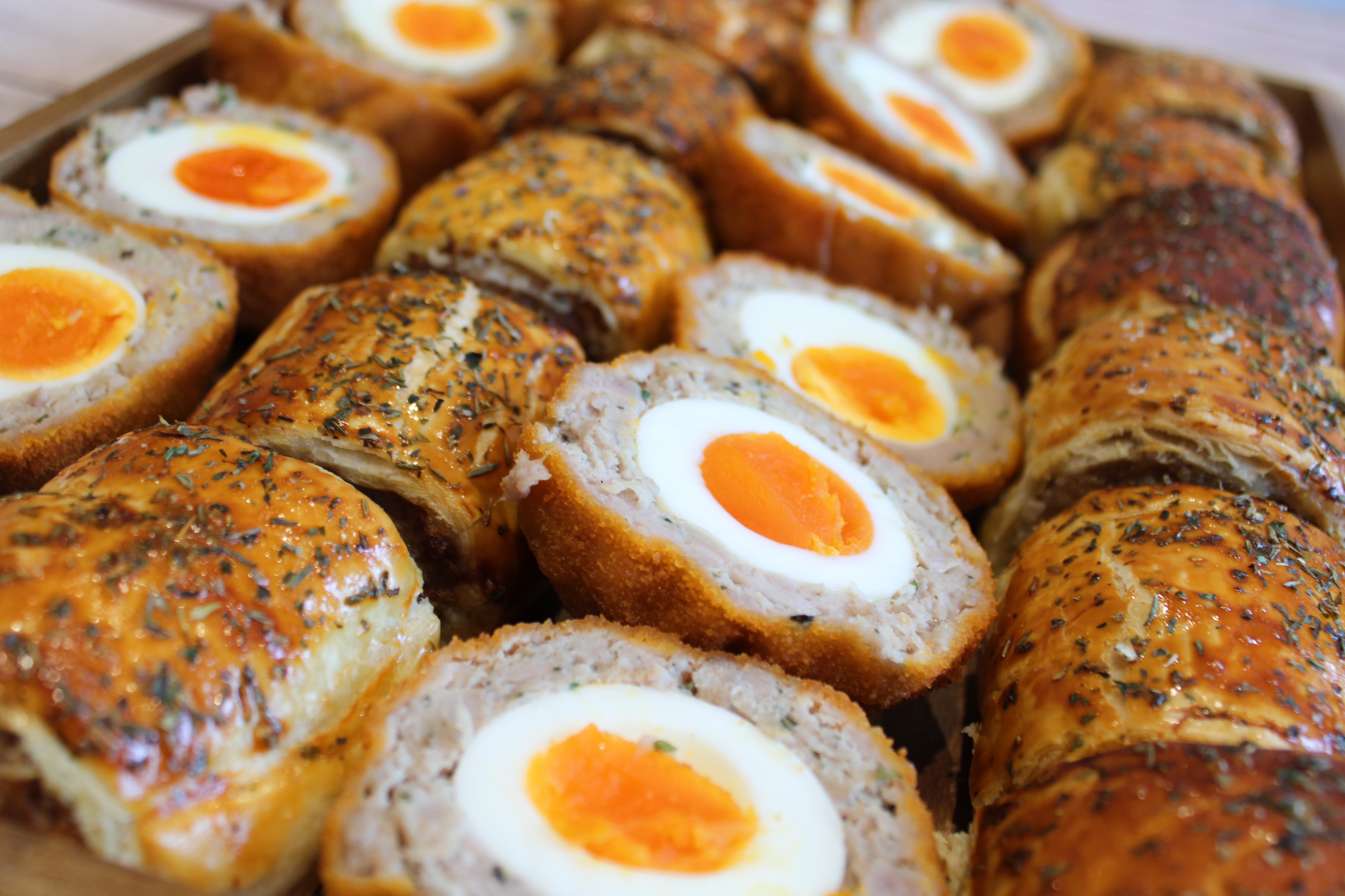 Homemade scotch eggs, hand-rolled and herbed