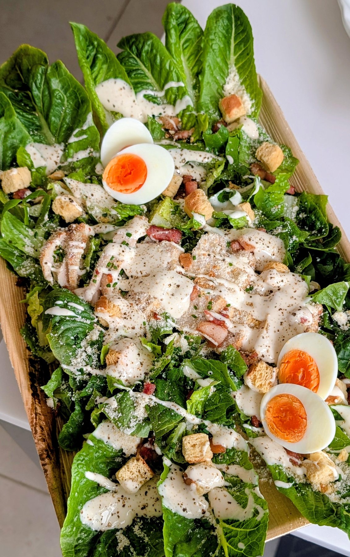 Chicken & Bacon Caesar Salad with eggs and croutons