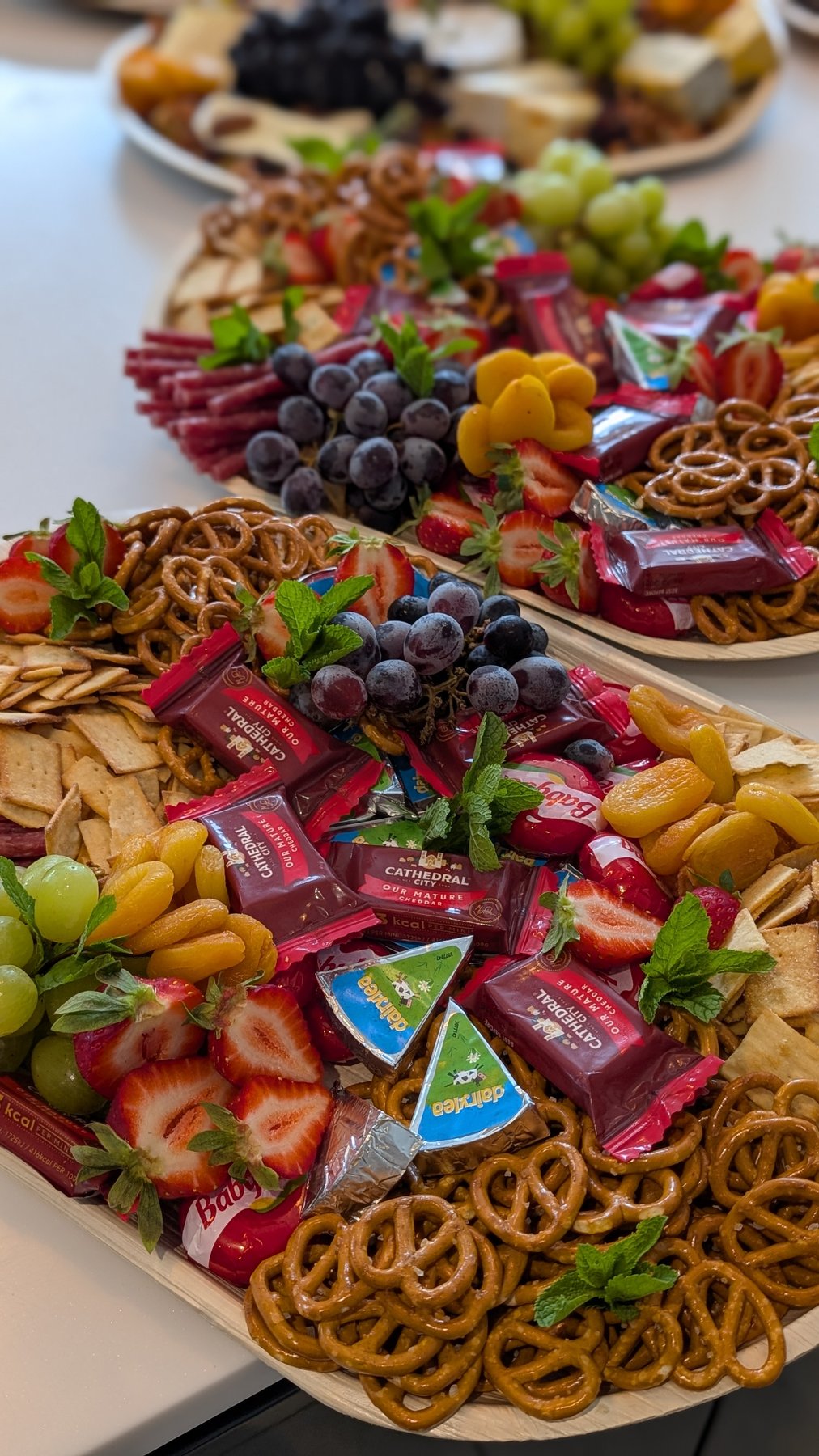 Kids Graze platter with mini cheeses, pretzels and fruit